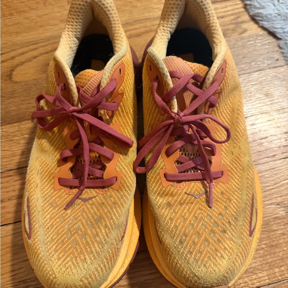 Hoka Vibrant Orange Sneakers with Red Accents